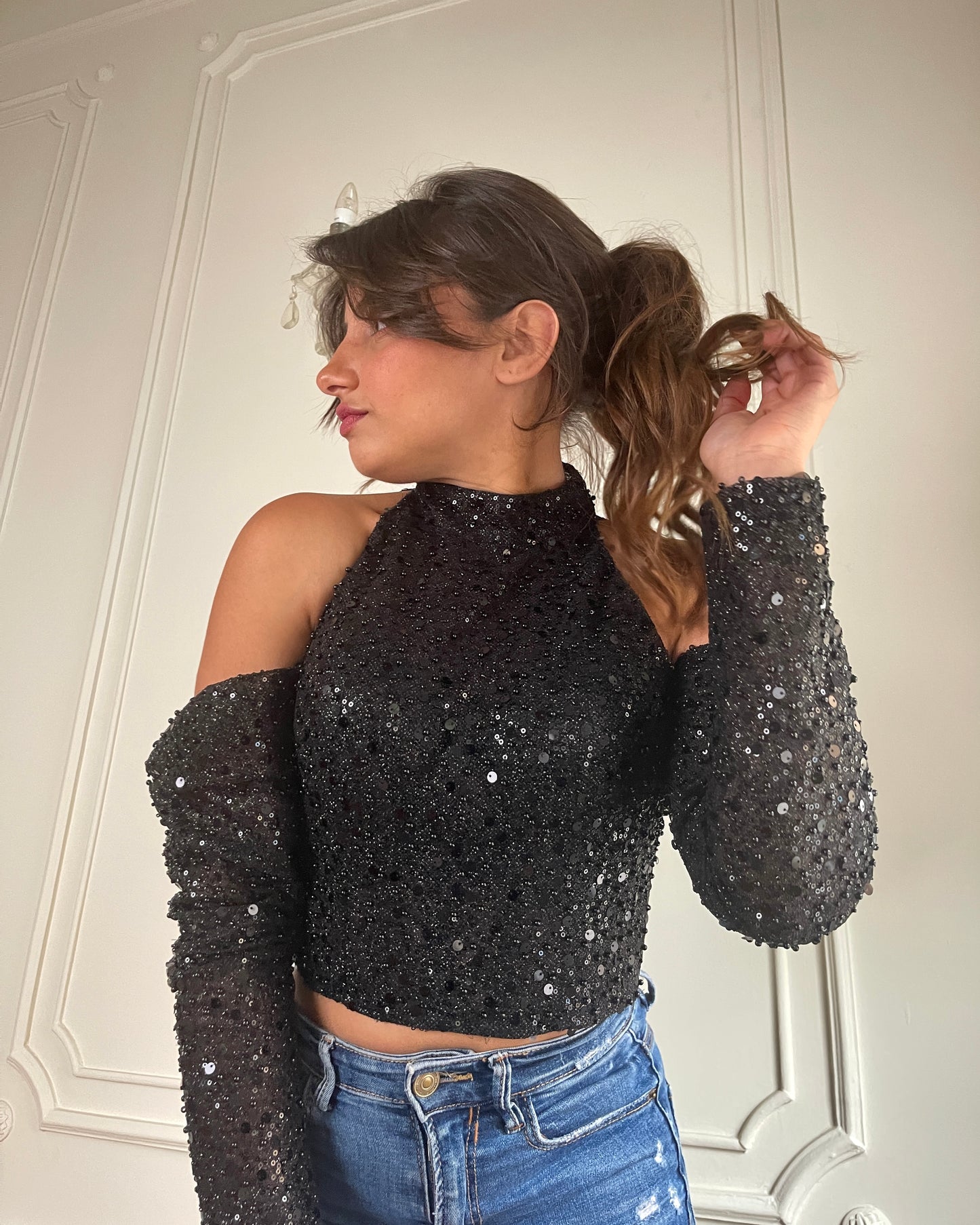 Black off-shoulder bustier with pearls
