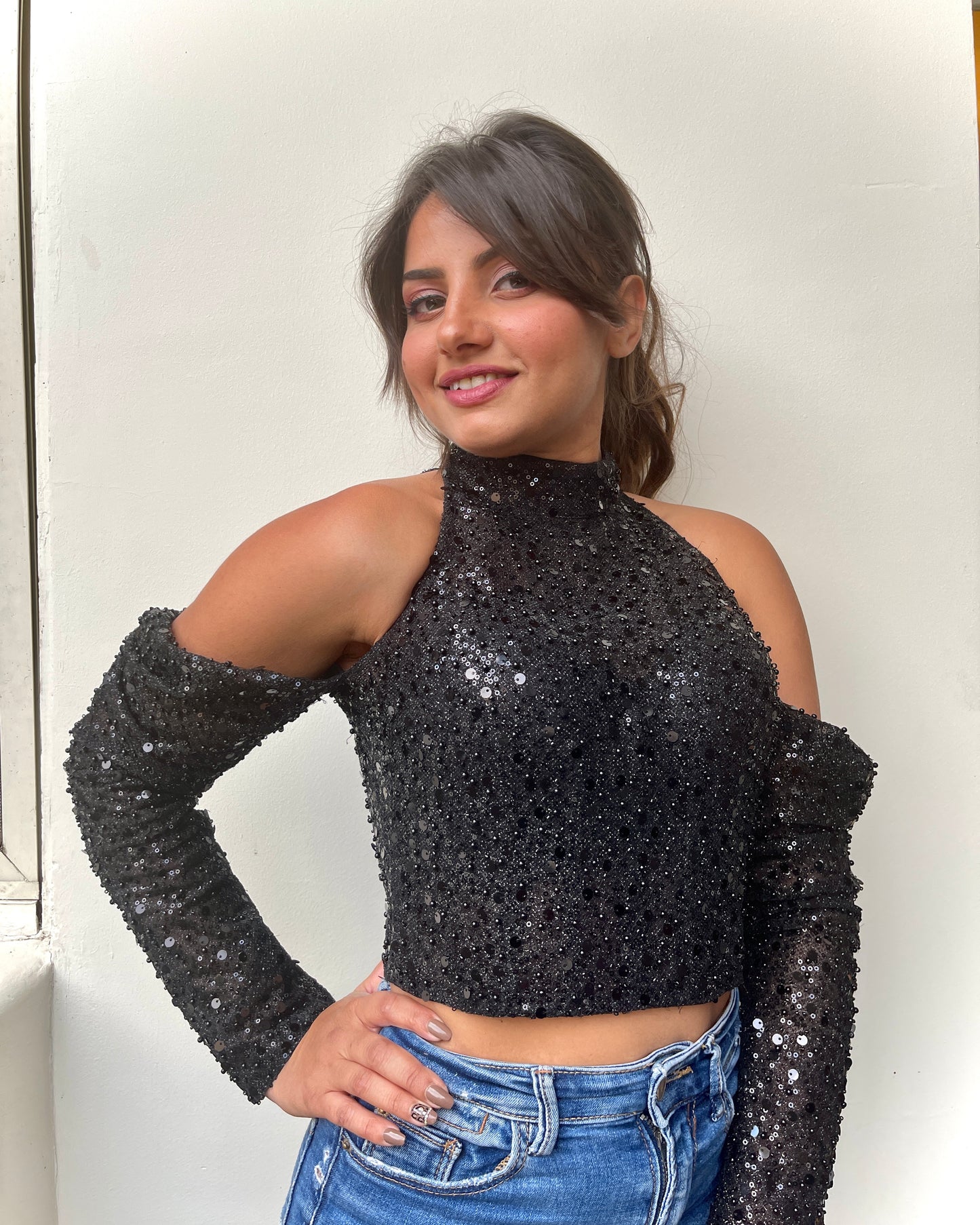 Black off-shoulder bustier with pearls